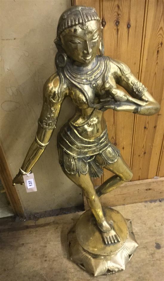 Balinese polished bronze figure of a dancer or dakini on lotus plinth